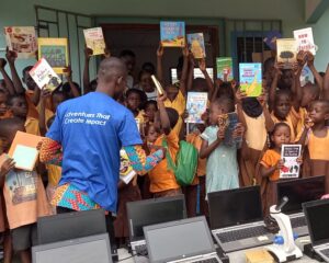 Children holding up books